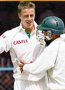 South African bowler Morne Morkel and Hashim Amla celebrate the wicket of Wasim Jafar on Saturday.