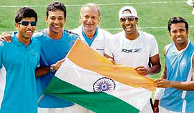 Rohan Bopanna, Mahesh Bhupati, Prakash Amritraj and captain Leander Paes with the national flag after winning the Asia/Oceania Zone Group I Davis Cup tie against Japan in New Delhi on Saturday.