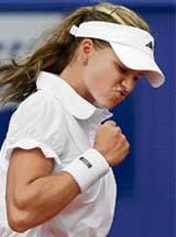 Maria Kirilenko of Russia reacts after winning a point against Petra Cetkovska of Czech Republic during their second round match at the Estoril Open in Lisbon