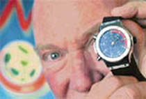 Jean-Claude Biver, CEO of Swiss watchmaker Hublot poses with the official Euro 2008 football championships referee wrist watch in Regensdorf on Thursday for the upcoming European soccer championships