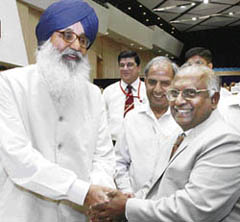 Chief Justice of India K.G. Balakrishnan with Chief Minister of Punjab Parkash Singh Badal during the Chief Ministers and Chief Justices Conference at Vigyan Bhawan in New Delhi on Saturday. 