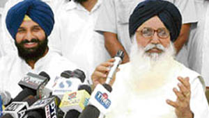 Chief Minister Parkash Singh Badal addresses a press conference at Amritsar on Sunday. Also in the picture is Cabinet minister Bikram Majithia. 