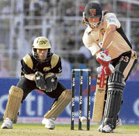Deccan Chargers' Andrew Symonds in action against Kolkata Knight Riders during their IPL match in Kolkata on Sunday.