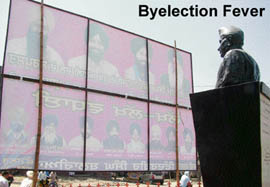 A hoarding of the Shiromani Akali Dal blocks view of  the statue of a freedom fighter in Amritsar.