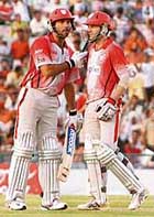 Simon Katich (R) and Yuvraj Singh, architects of the Kings XI Punjab win over Delhi Daredevils in the DLF IPL match, at the PCA Stadium in Mohali on Sunday.