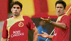 Bangalore Royal Challengers� Anil Kumble (R) and Misbah-ul-Haq during a practice session at Chinnaswamy stadium in Bangalore on Friday.