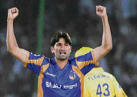 Rajasthan Royals' Sohail Tanvir exults after taking the wicket of Chennai Super Kings batsman Parthiv Patel during IPL T20 match at Sawai Mansingh Stadium in Jaipur on Sunday.