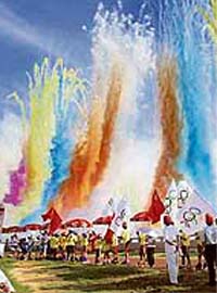 Fireworks explode at a ceremony for the Olympic torch in Haikou, China