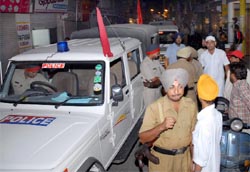 Police staging a flag march in Bathinda