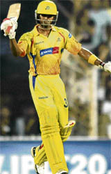 Chennai Super Kings� S. Badrinath raises his bat after his 50 against Kings XI Punjab during the IPL T20 match at MAC Stadium in Chennai on Saturday.