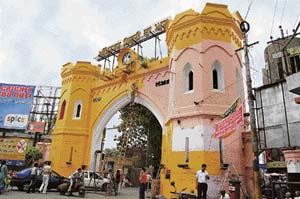 The historical Hall Gate, which is being painted yellow. The change of colour from red to pink and now yellow has come as a shock for heritage lovers.