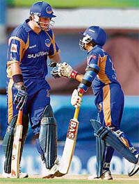 Rajasthan Royals' Graeme Smith with partner S Asnodkar during the IPL T20 match against Chennai Super Kings at MAC Stadium in Chennai