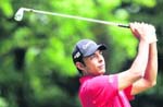Jyoti Randhawa plays a shot in the PGA golf Championship final round at Wentworth Club, Virginia Water, in southern England on Sunday. 
