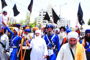 Activists of the Virsa Sambhal Lehar protest against vulgar TV ads and music videos in Jalandhar on Friday. 