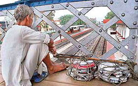 A stranded hawker at Shantiniketan station on Thursday as West Bengal remained shut owing to a bandh called by the Left Front in protest against the hike in fuel prices.
