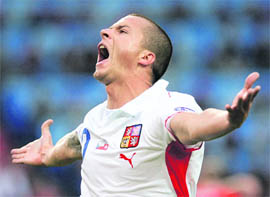 Czech Republic�s Vaclav Sverkos celebrates his goal during their Group A Euro 2008 match against Switzerland at St. Jakob Park stadium in Basel on Saturday.