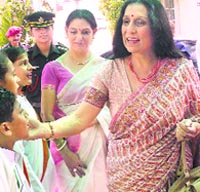 Kirti Kapoor, wife of the Army Chief, interacts with special children in Pathankot