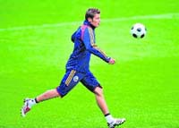 Romania�s Adrian Mutu runs for the ball during a training session on the eve of their Euro 2008 match against Italy, at AFG Arena stadium on Thursday in St.Gallen. 