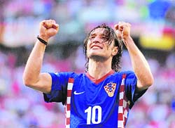 Croatian midfielder Niko Kovac celebrates after his team defeated Germany in their Group B match on Thursday at Woerthersee stadium in Klagenfurt, Austria. � AFP