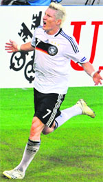 German midfielder Bastian Schweinsteiger celebrates after scoring during the quarterfinal match against Portugal on Thursday at St. Jakob-Park in Basel. Germany won 3-2.