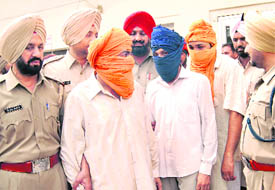 Suspected terrorists of �Khalistan Zindabad Force� in police custody at Jagraon on Friday.