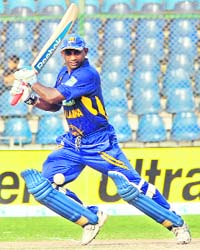 Sri Lankan cricketer Sanath Jayasuriya plays a stroke during the Super League Asia Cup match between Sri Lanka and Bangladesh at the National Stadium in Karachi