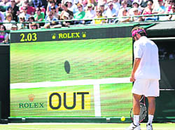Arnaud Clement of France plays against Rainer Schuettler of Germany in the Men's Singles quarterfinal match, during the 2008 Wimbledon Championships at the All England Tennis Club in south-west London, on Thursday. 