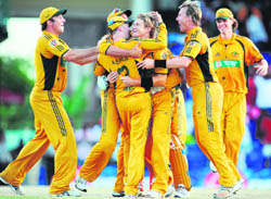 Australian cricketer Shane Watson (C) and teammates celebrate their one-run win against West Indies at Warner Park in Basseterre, Saint Kitts, during their ODI match on Friday.