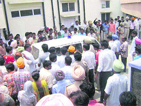 The ambulance van with the body of Neeru Bala leaves Singla Surgical Hospital in Sangrur for Patiala on Saturday.