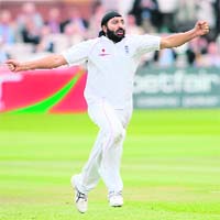 England�s Monty Panesar celebrates after dismissing South African batsman AB de Villiers at Lord�s on the third day of the first Test
