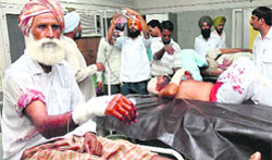 The villagers who suffered injuries in a SAD-Congress clash in Daan Singh Wala village being treated at the Bathinda civil hospital