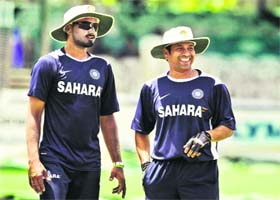 Harbhajan Singh and Sachin Tendulkar look on during a practice session on Tuesday ahead of the first Test against Sri Lanka in Colombo
