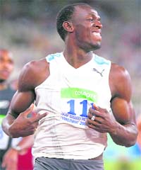 Powell set a world record of 9.77 and improved it to 9.74 in 2007