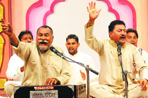 Wadali Brothers perform during a function held to mark the eighth anniversary of DD Punjabi in Jalandhar. 