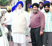 SGPC president Avtar Singh (L) and adviser to CM Daljit Singh Cheema pay a surprise visit to the residence of Giani Joginder Singh Vedanti, former jathedar, Akal Takht, at Amritsar on Friday.