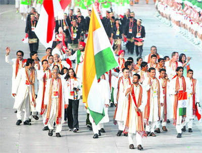India�s Olympic team follow their national flag-bearer Rajyavardhan Singh Rathore during the opening ceremony of the Beijing 2008 Olympic Games at the National Stadium on Friday.