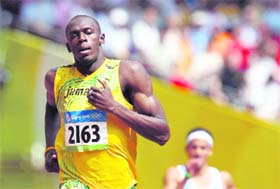 Bolt competes in 200m heat