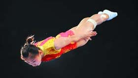 China�s He Wenna competes in the women�s trampoline final of the artistic gymnastics event in Beijing