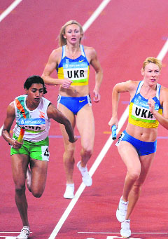 India and Ukraine compete during the women's 4�400m relay round 1 heat 1 at the National Stadium during the Beijing Olympics on Friday.