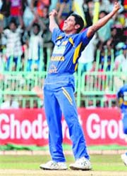 Chaminda Vaas celebrates claiming his 400th ODI wicket after the dismissal of Yuvraj Singh