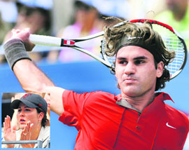 Roger Federer of Switzerland hits against Thiago Alves of Brazil at the US Open tennis tournament in Flushing Meadows, NY.