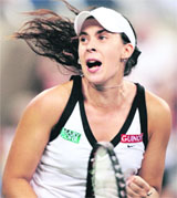 Marion Bartoli of France celebrates match point against Lindsay Davenport of the USA at the US Open in Flushing Meadows, NY. Bartoli won 6-1 7-6 (3)