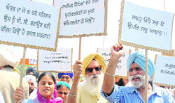 Members of the Punjabi Editors Forum protest against the appointment of Dr Jasbir Singh Ahluwalia as vice-chancellor of under-construction Sri Guru Granth Sahib World University at Fatehgarh Sahib