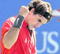 Roger Federer of Switzerland celebrates after defeating Radek Stepanek of the Czech Republic in the third round of the US Open tennis tournament on Sunday.