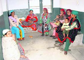 Patients await their turn at PHC, Barot.