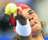 Rafael Nadal of Spain prepares to serve against Mardy Fish of the US during their quarterfinal match on Wednesday.
