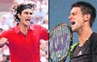 Roger Federer (L) of Switzerland reacts after defeating Gilles Muller of Luxembourg in their US Open quarterfinals match
