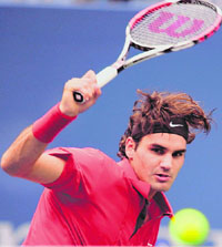 Roger Federer of Switzerland watches a return to Novak Djokovic of Serbia during the men�s semis at the US Open on Saturday in New York. 
