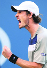 Andy Murray reacts after beating Rafael Nadal during their semifinal match of the U.S. Open on Sunday. Murray won 6-2, 7-6, 4-6, 6-4. 
