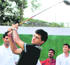 Sourav Ganguly tries his hand at golf during the inaugural session of the All India Police Golf Tournament organised by BSF at Royal Calcutta Golf Club in Kolkata on Thursday.